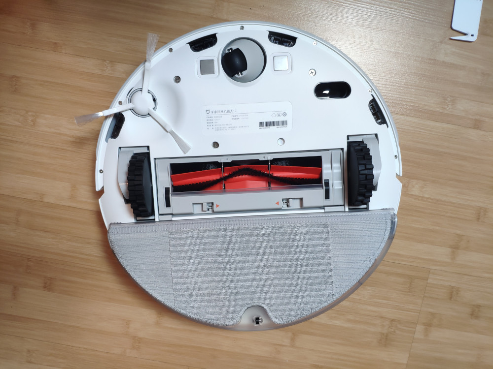 The Xiaomi Mijia 1C with mopping attachments on